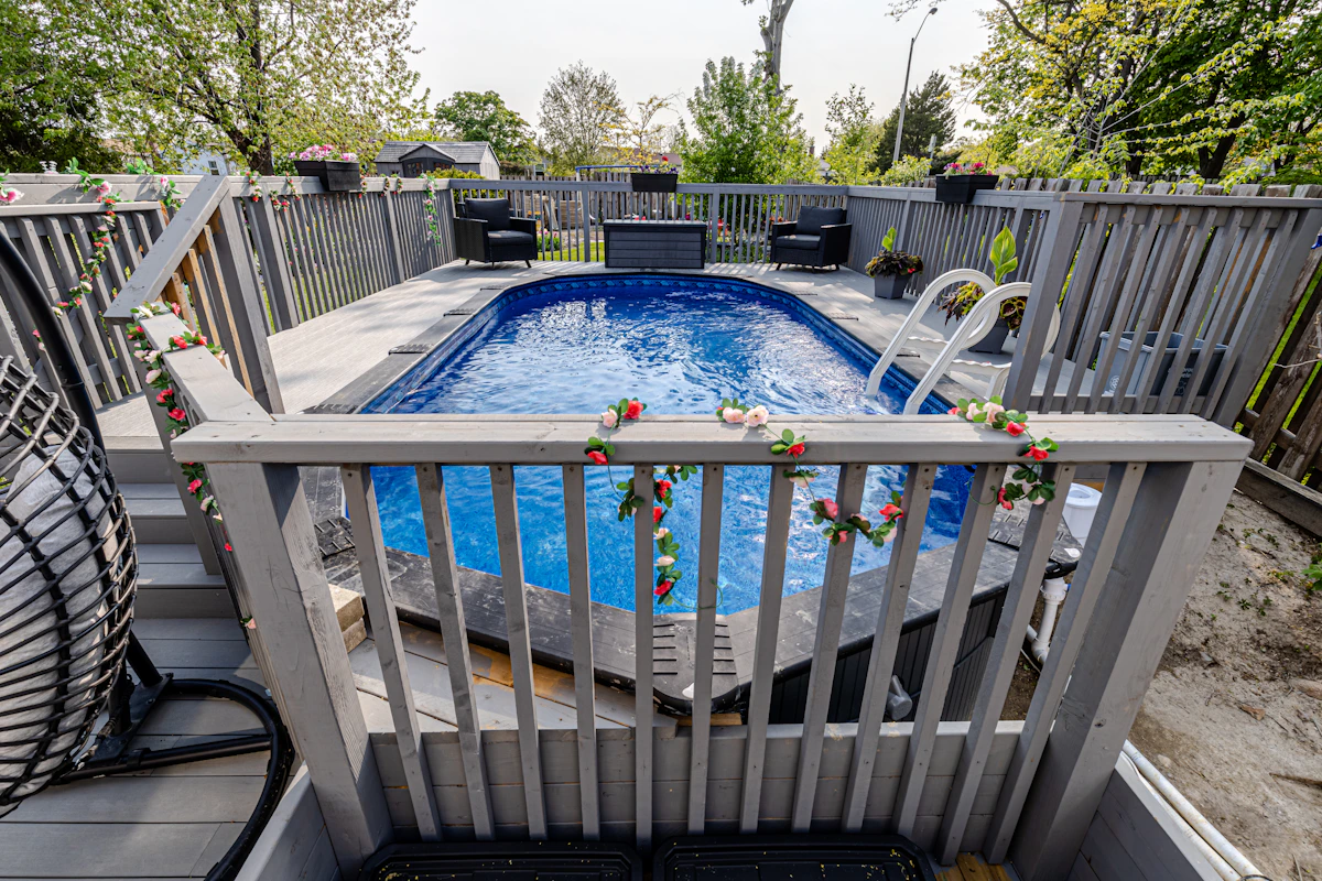 Wood Deck Steps Leading to Backyard Wood deck steps and stairs leading to a backyard outdoor living area