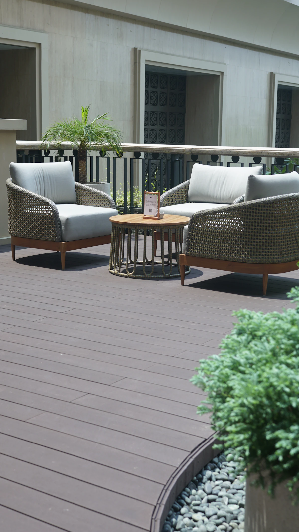 Wicker chairs and table on a sunny wooden deck in Pasco County FL Wicker chairs and table on a sunny wooden deck in Pasco County FL